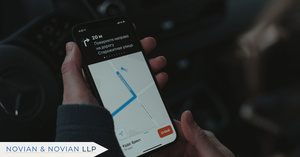 Uber trip details shown on a phone, representing accident claims and settlements